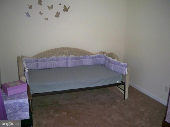 1458 Cox Neck Road Chester, MD 21619 - Photo 19 of 20 a bed room with a bed