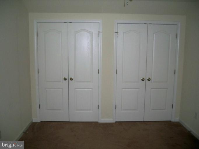 1458 Cox Neck Road Chester, MD 21619 - Photo 10 of 20 an empty room with closet area