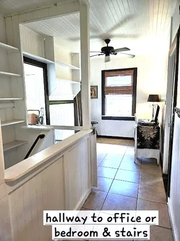 a view of a living room and a window