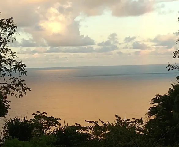 a view of ocean and sunset