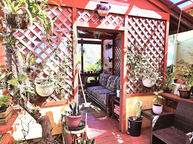 a view of a entryway with flower pots