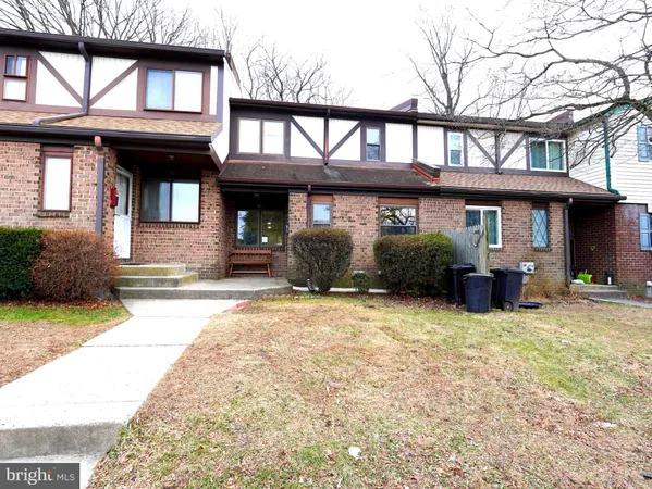 a front view of a house with a garage