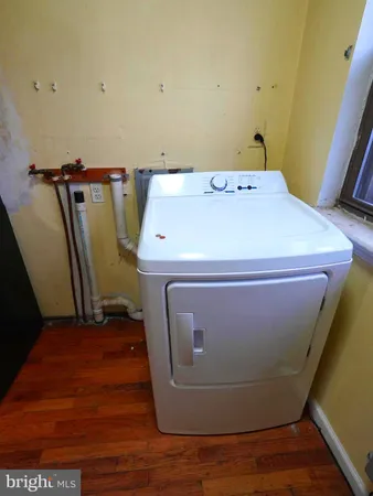 a utility room with washer and dryer