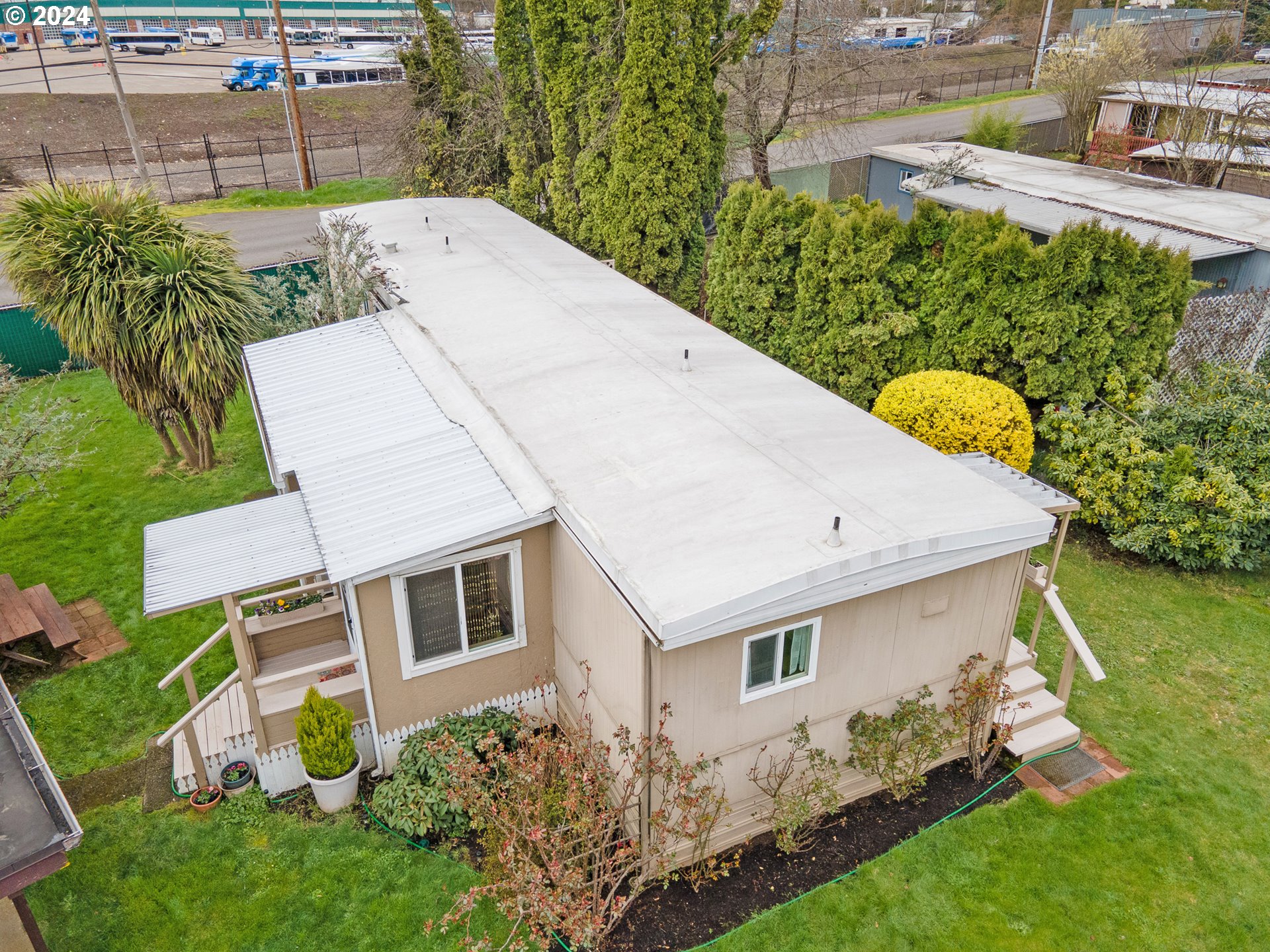 a aerial view of a house with garden