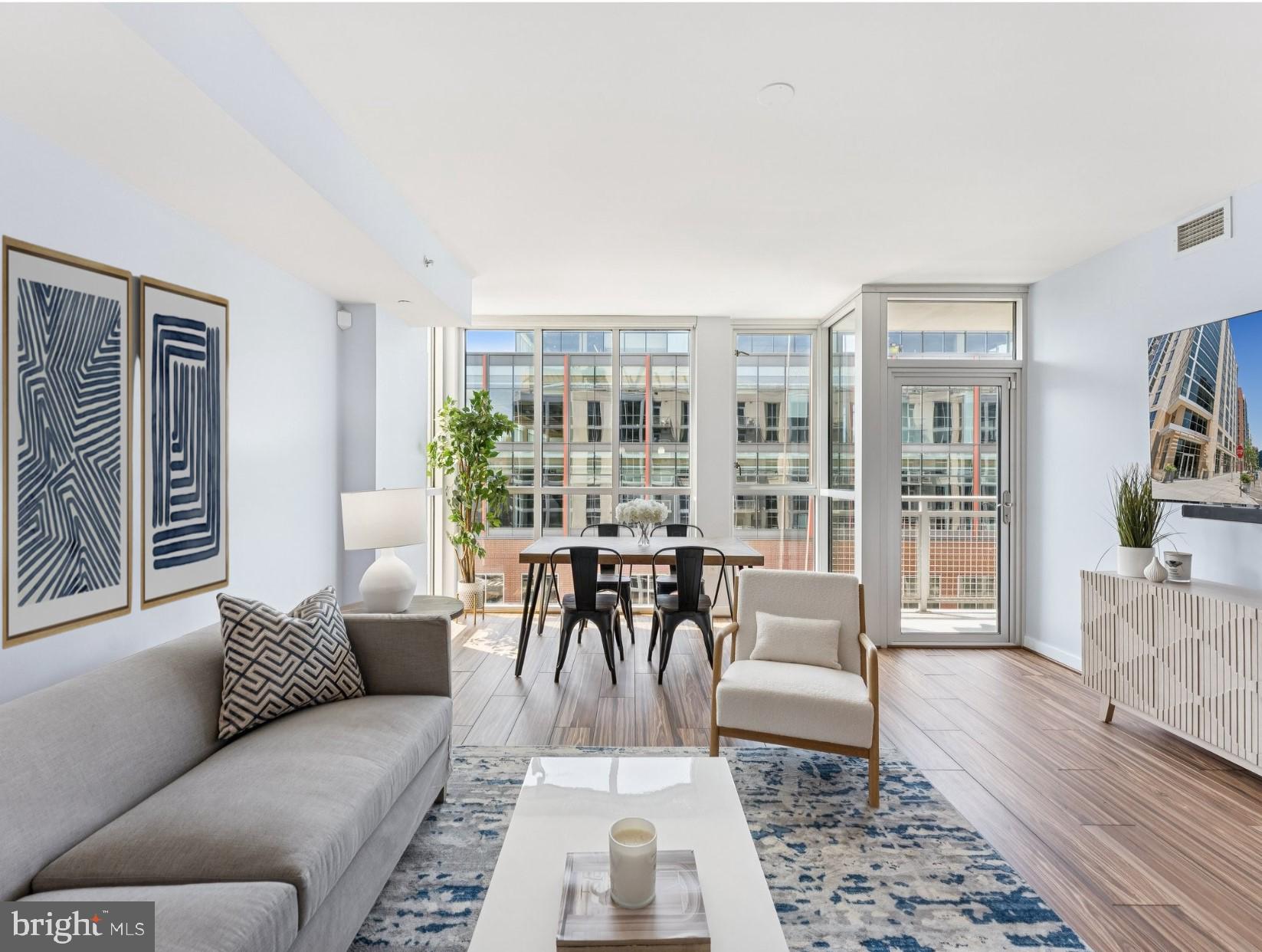 1025 First Street Southeast, Unit 1212 Washington, DC 20003 - Photo 7 of 34 Living / DIning room has floor to ceiling windows