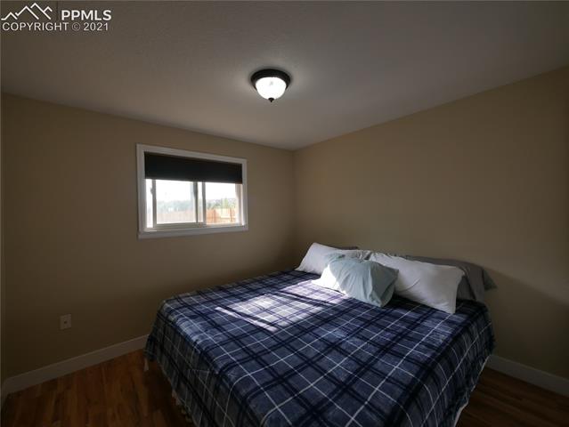 402 Yellowstone Road Colorado Springs, CO 80910 - Photo 15 of 28 Master Bedroom facing window