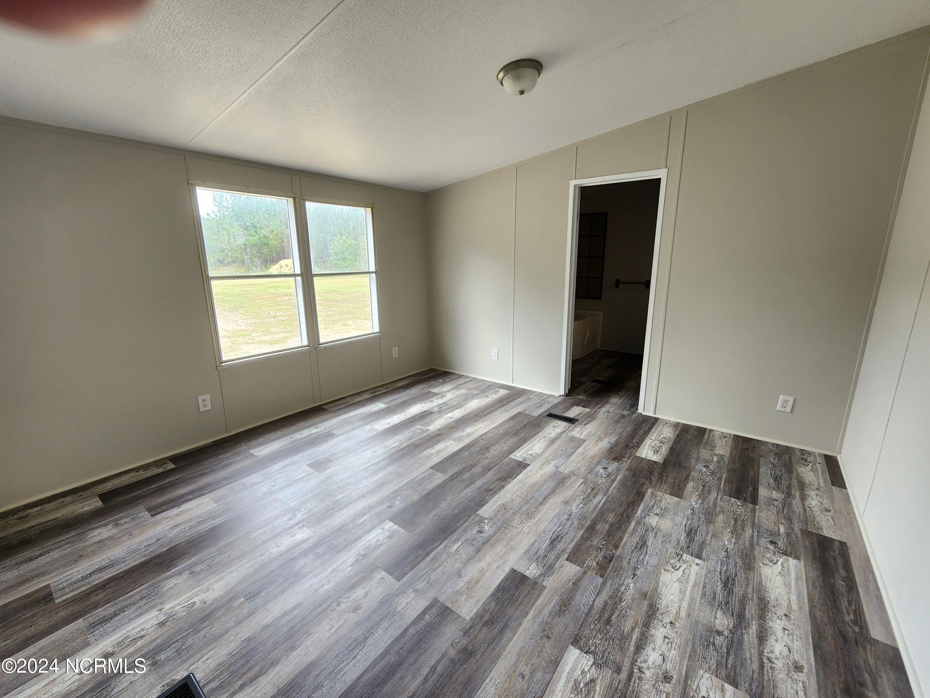 567 Davis Road Garland, NC 28441 - Photo 6 of 10 Primary bedroom