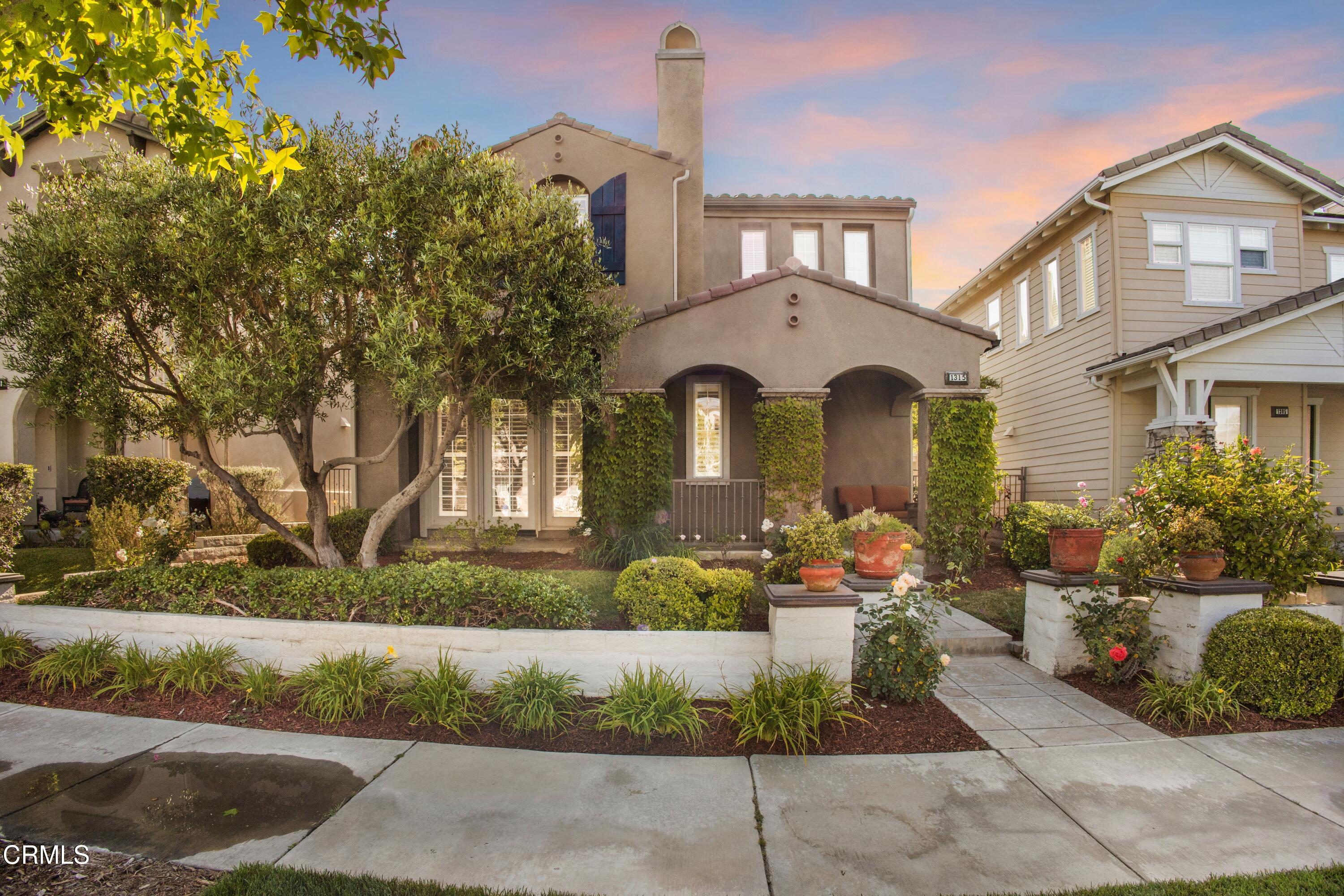 1315 Donegal Way Oxnard, CA 93035 - Photo 1 of 48 a front view of a house with a yard