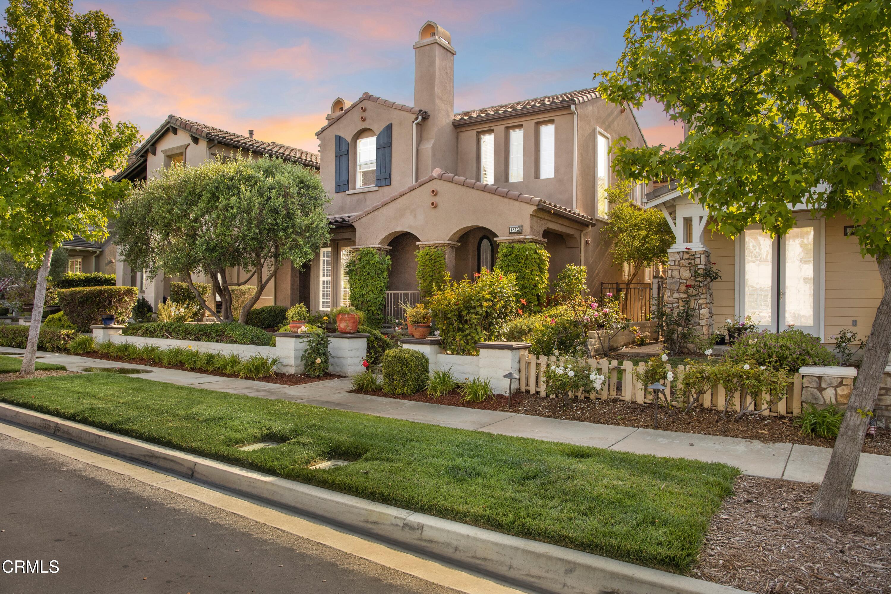 1315 Donegal Way Oxnard, CA 93035 - Photo 2 of 48 a front view of a house with a yard