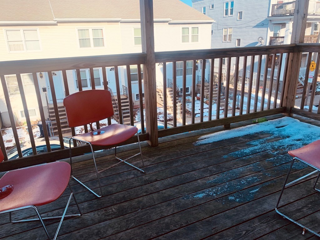 7 Sudan Street, Unit 2 Boston, MA 02125 - Photo 10 of 10 a balcony with wooden floor outdoor seating