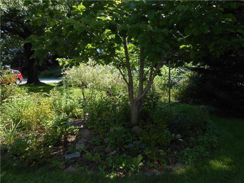 12 Walnut Street Topsham, ME 04086 - Photo 11 of 12 Yard/Garden. The gardens and...