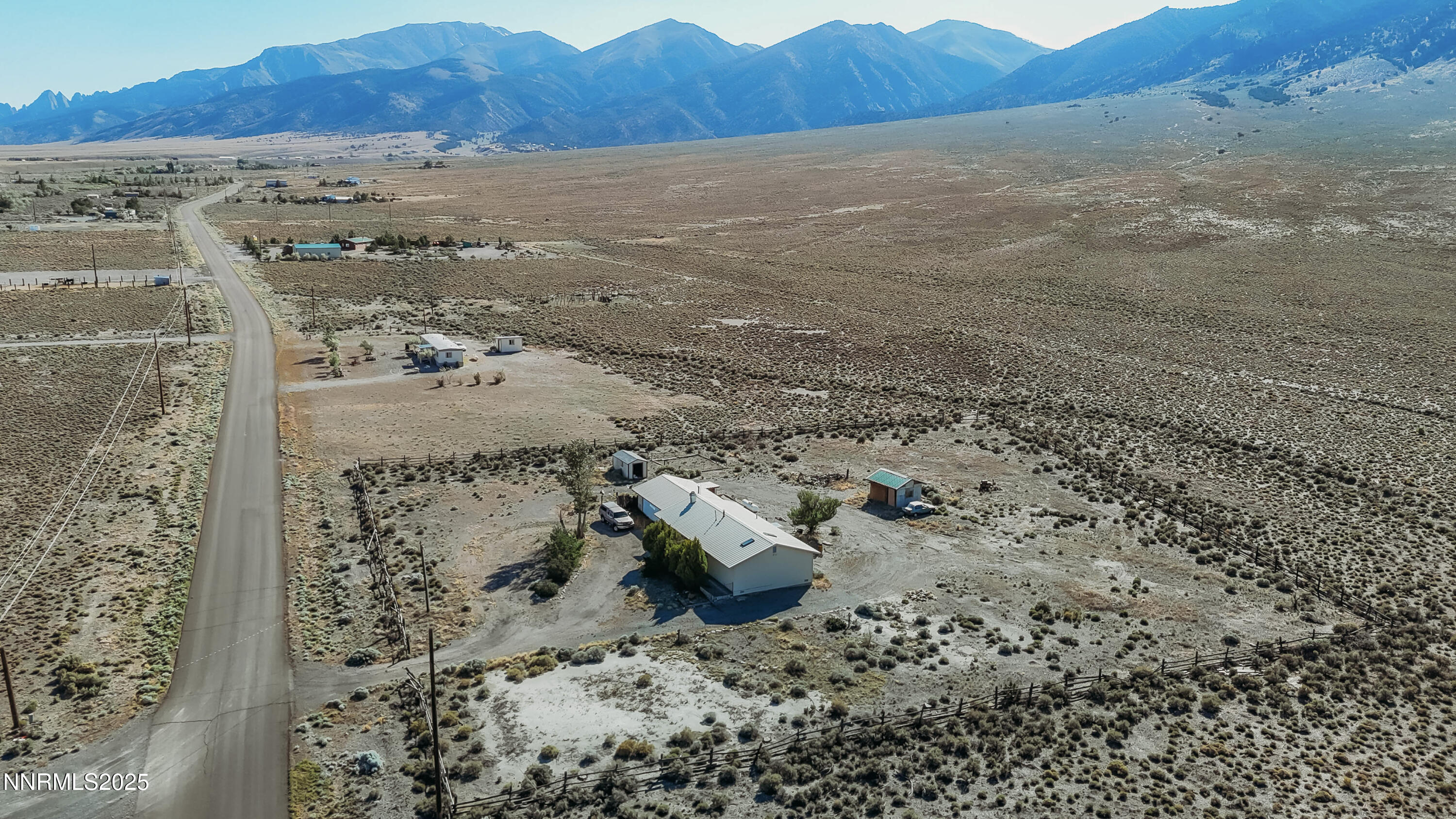 316 Toiyabe Road Kingston, NV 89310 - Photo 4 of 32 a view of mountains with green field and mountain view