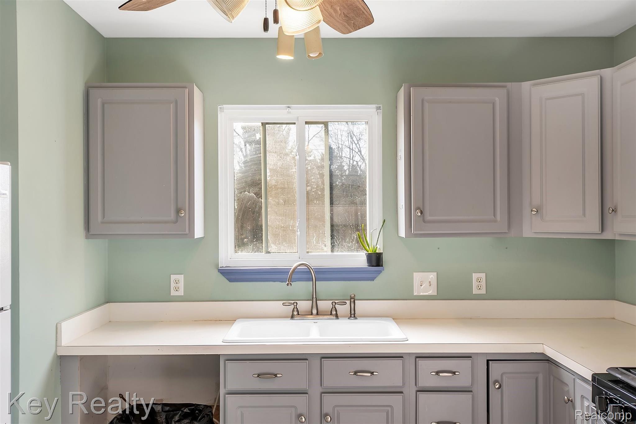 241 East Walnut Street Webberville, MI 48892 - Photo 12 of 41 12-241 E Walnut St-windowstill-real.jpg