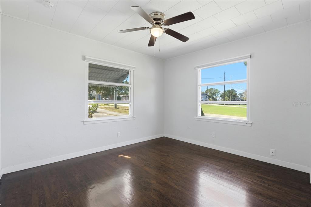 231 North Ridgewood Avenue Ormond Beach, FL 32174 - Photo 19 of 52 a view of an empty room with a window