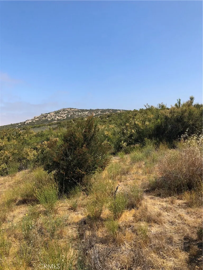 58 Madera Street Hemet, CA 92544 - Photo 3 of 5 a view of lake with mountain
