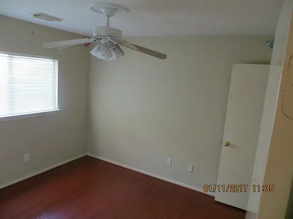 a bathroom with a toilet and a sink