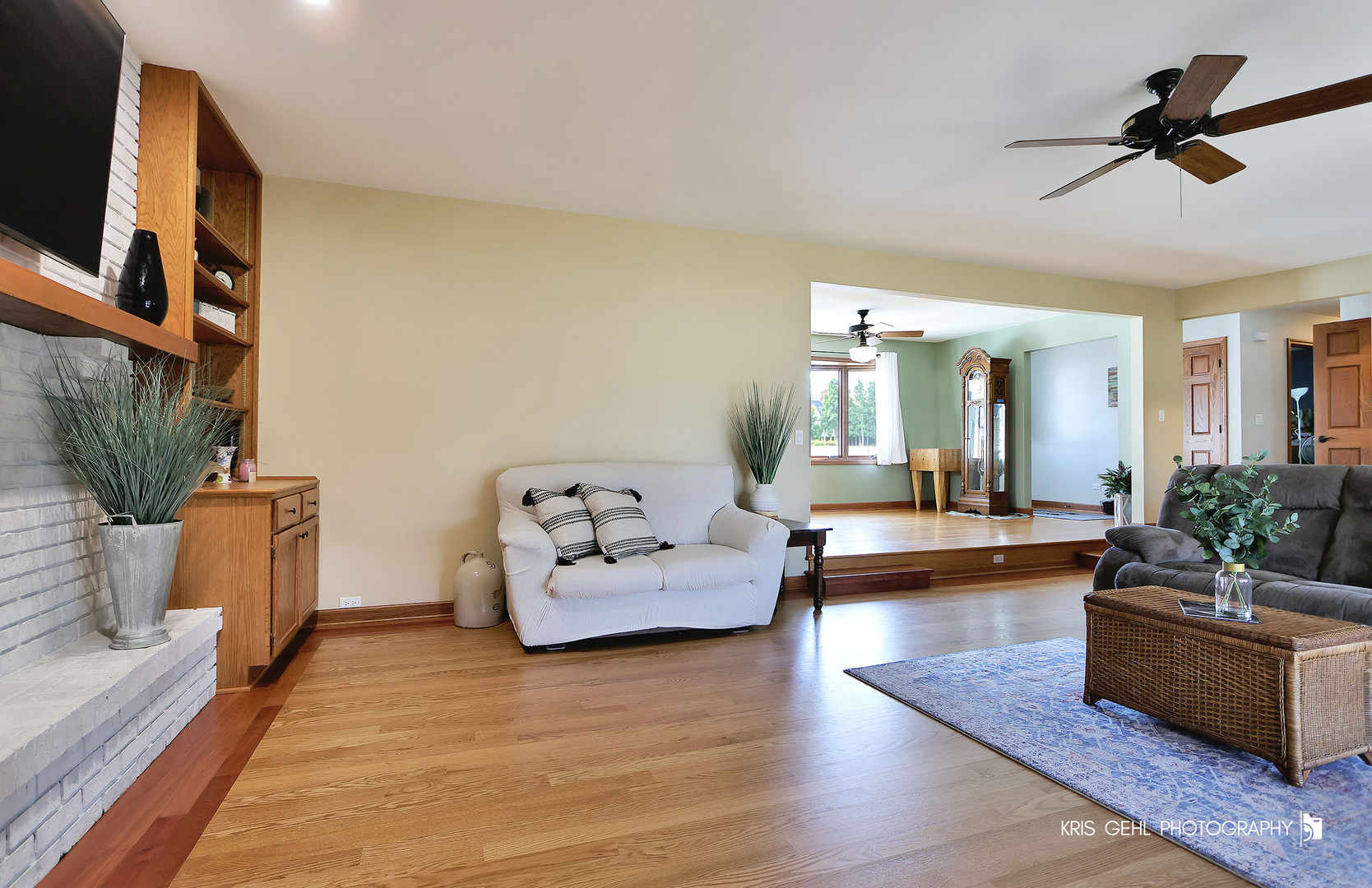 7149 Meadow Lane Cary, IL 60013 - Photo 6 of 37 a living room with furniture and a wooden floor