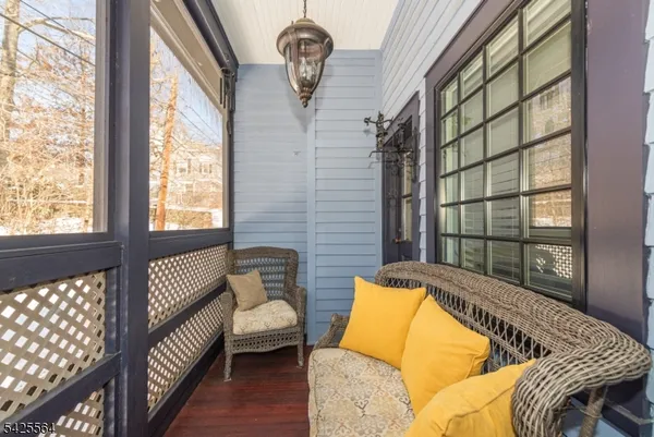 a view of a porch with a bench