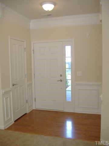 8304 Pilots View Drive, Unit 24 Raleigh, NC 27617 - Photo 9 of 10 Hardwood floors in foyer with extensive trim work detail Other