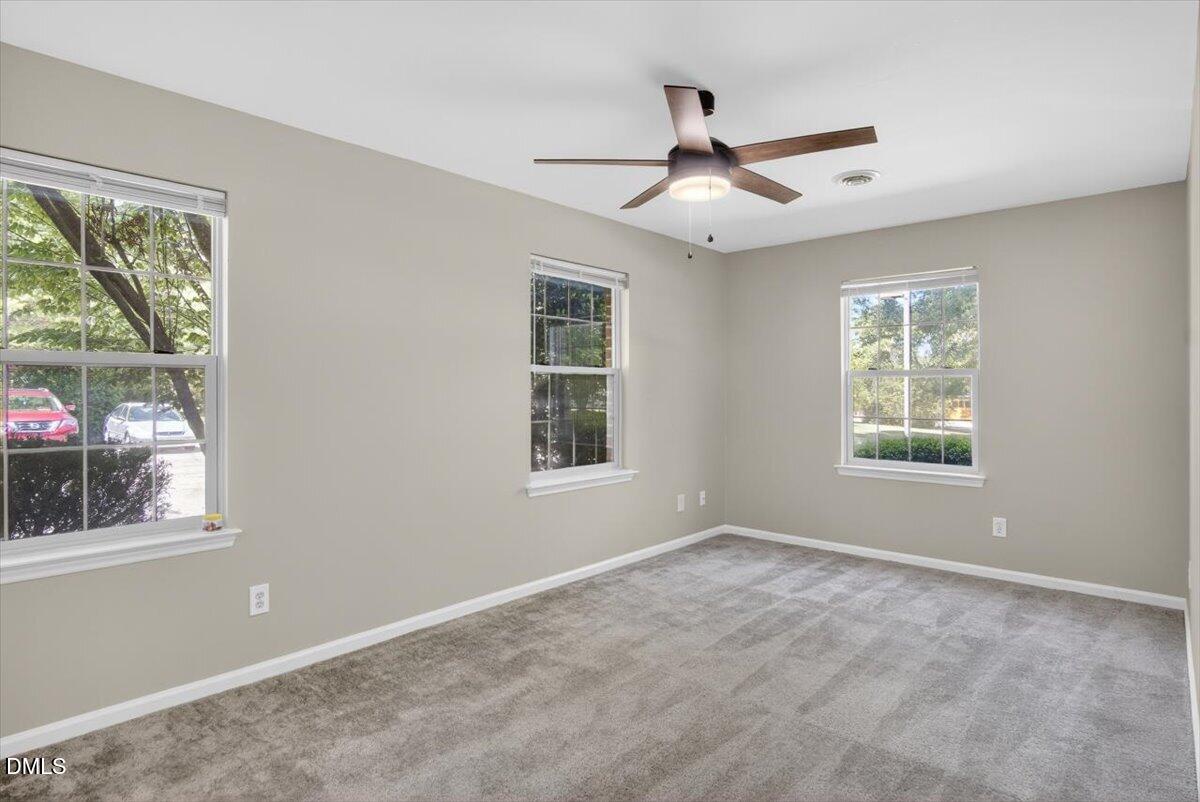1630 Oxford Road, Unit B Henderson, NC 27536 - Photo 12 of 30 a view of an empty room with a window