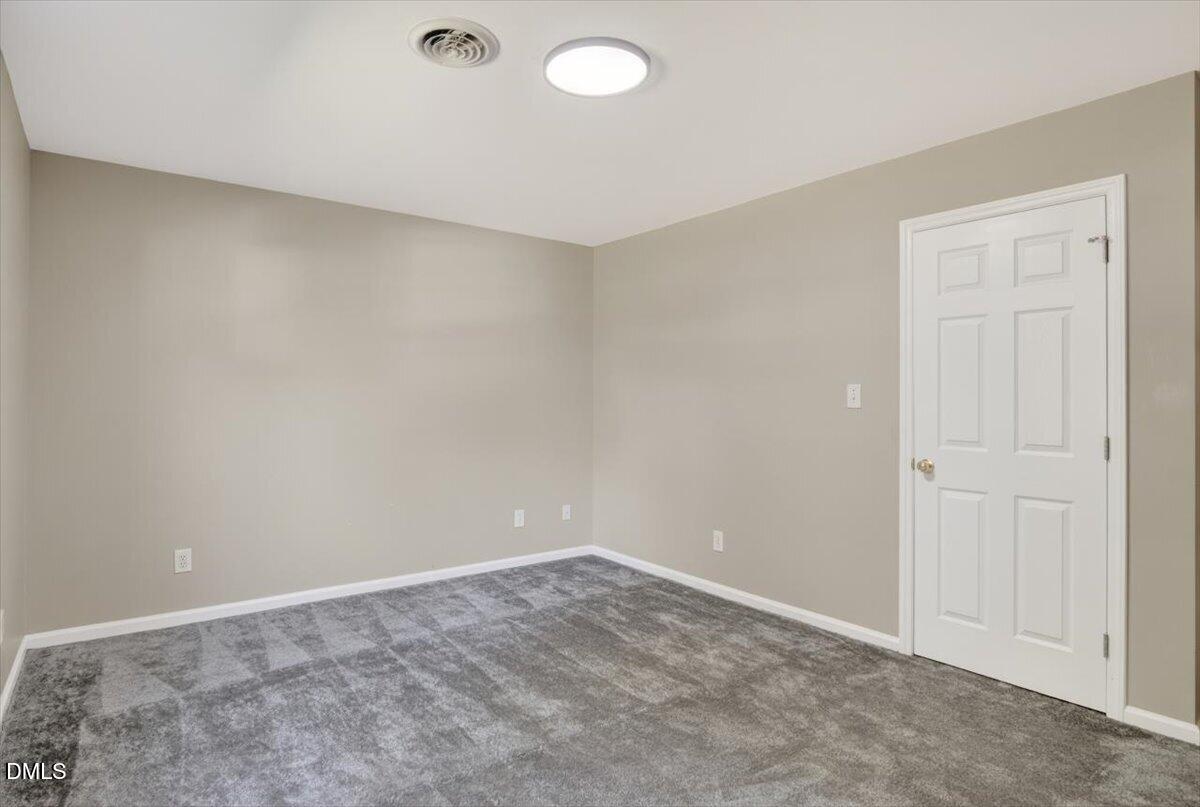 1630 Oxford Road, Unit B Henderson, NC 27536 - Photo 18 of 30 a view of an empty room