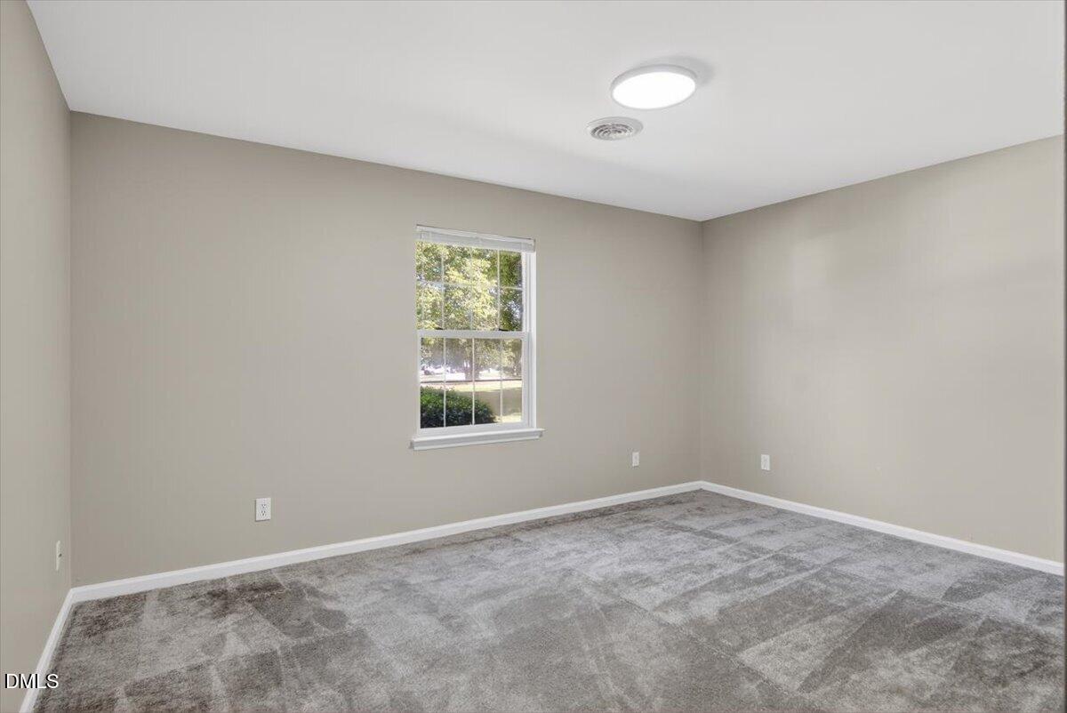 1630 Oxford Road, Unit B Henderson, NC 27536 - Photo 19 of 30 an empty room with a window