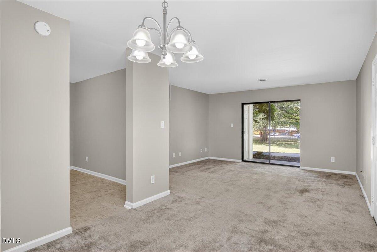 1630 Oxford Road, Unit B Henderson, NC 27536 - Photo 2 of 30 a view of an empty room with a window