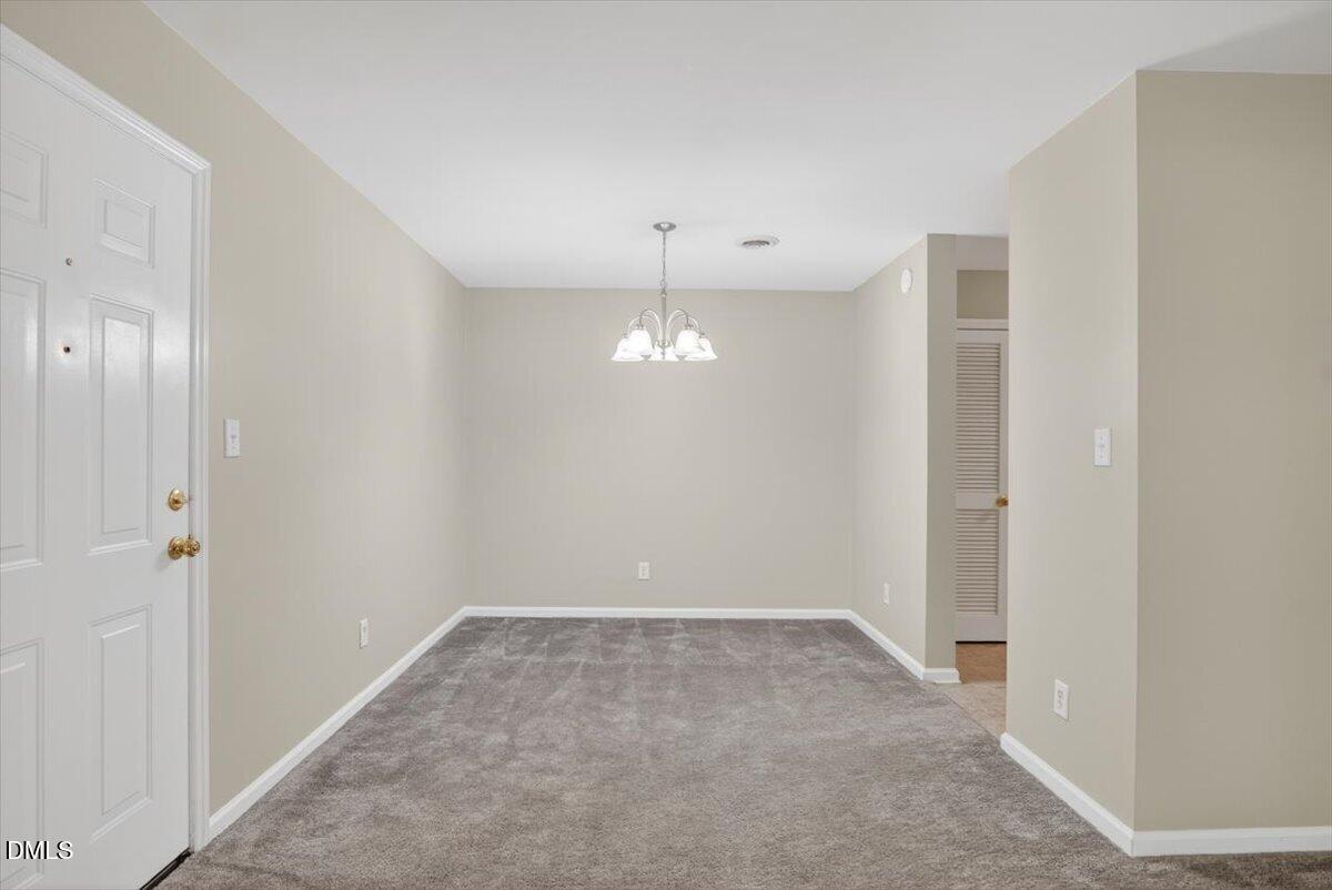 1630 Oxford Road, Unit B Henderson, NC 27536 - Photo 8 of 30 wooden floor in an empty room