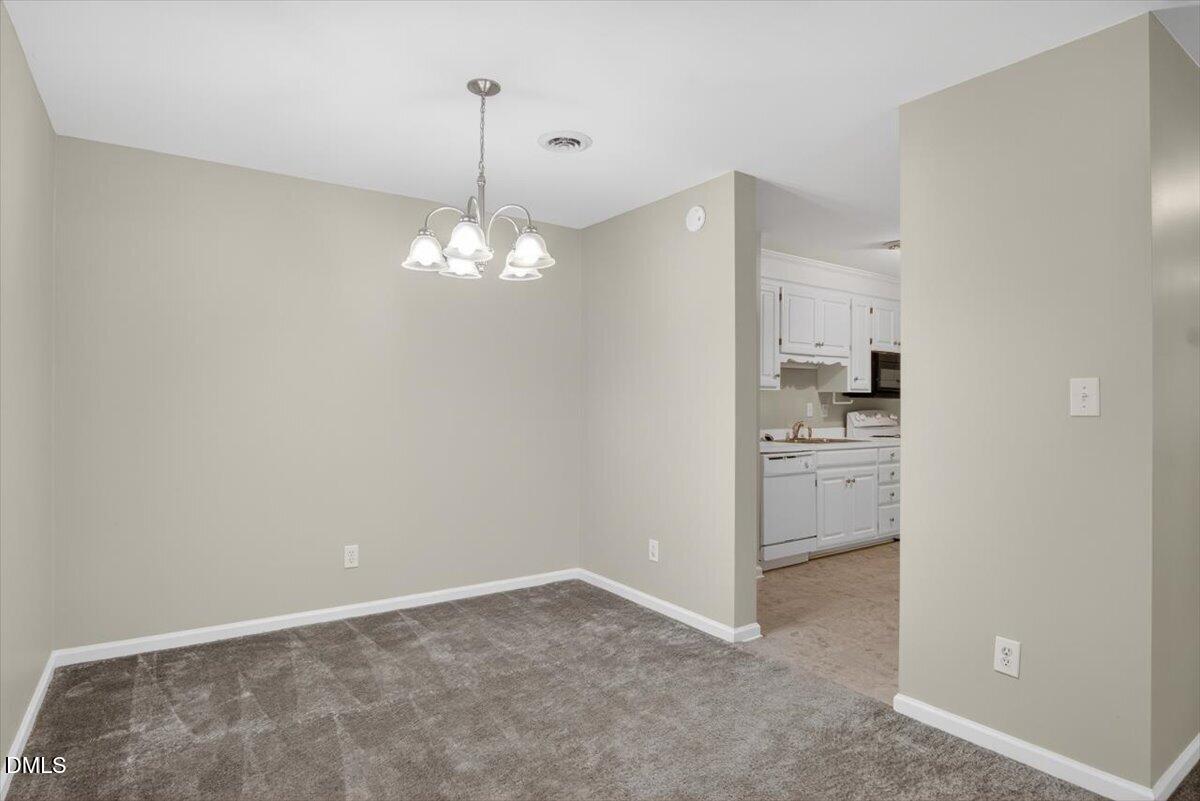 1630 Oxford Road, Unit B Henderson, NC 27536 - Photo 9 of 30 a view of a kitchen with a sink