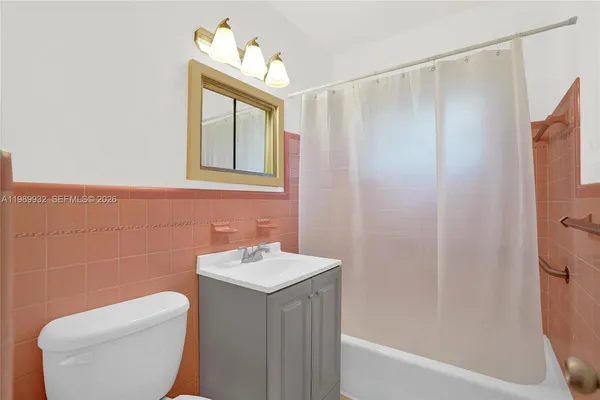 a view of backyard with swimming pool