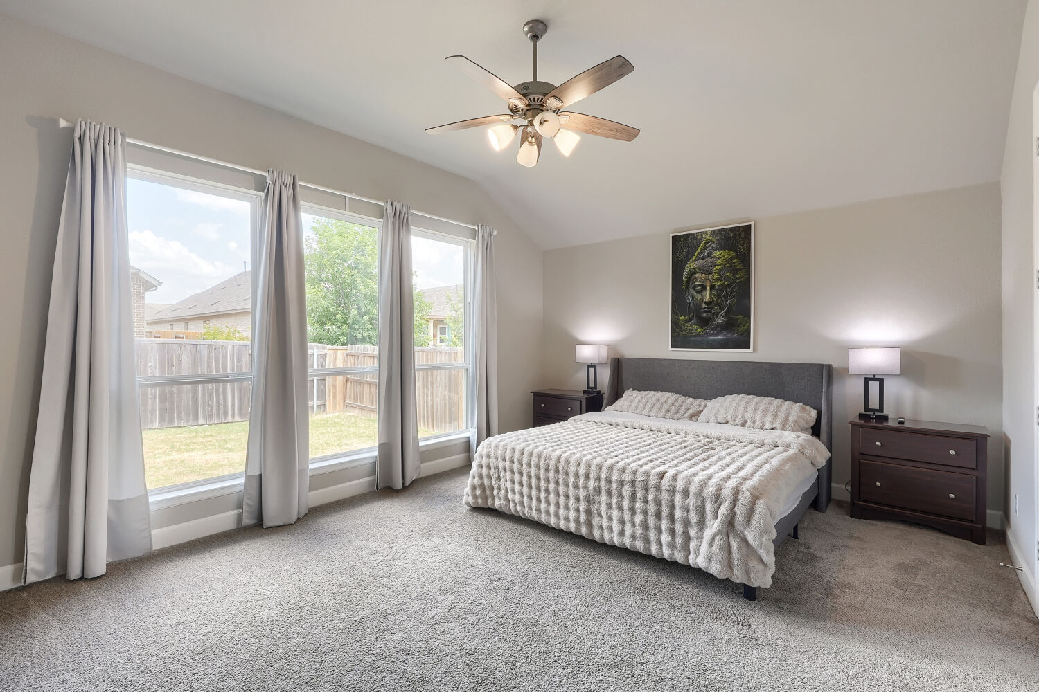308 Fawn Riv Run Kyle, TX 78640 - Photo 8 of 25 Spacious bedroom with great natural light.