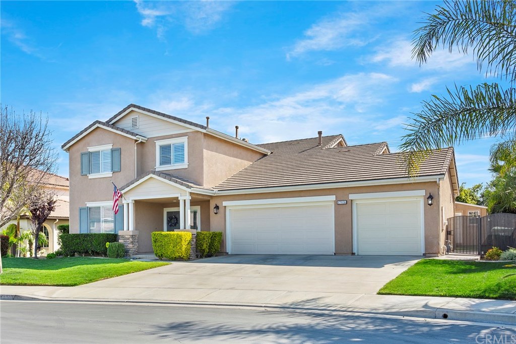 17936 Robusta Drive Riverside, CA 92503 - Photo 1 of 1 a front view of a house with a yard and garage