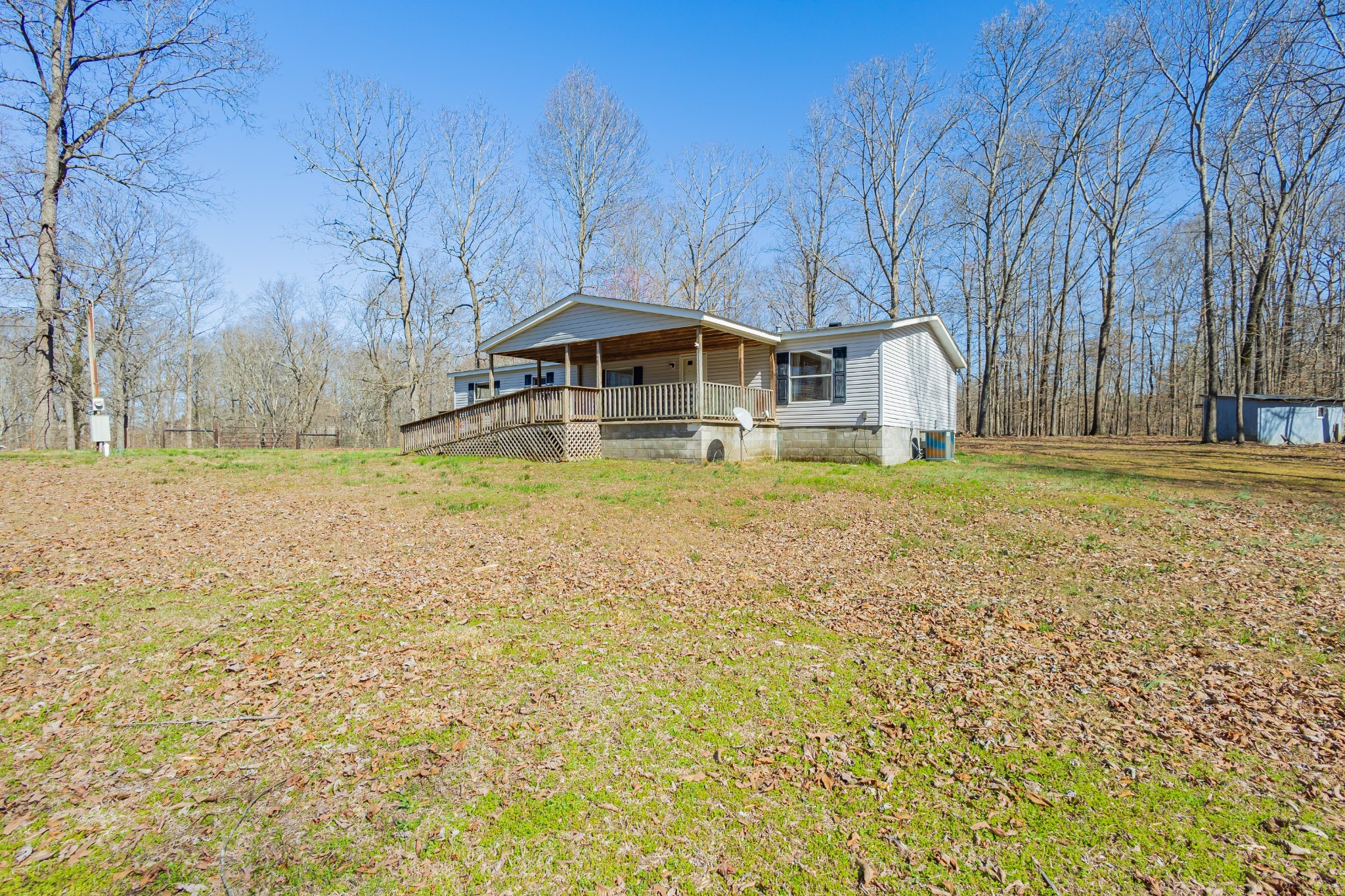 228 Shasteen Ridge Road Lynchburg, TN 37352 - Photo 4 of 53 a swimming pool is sitting in the middle of a yard