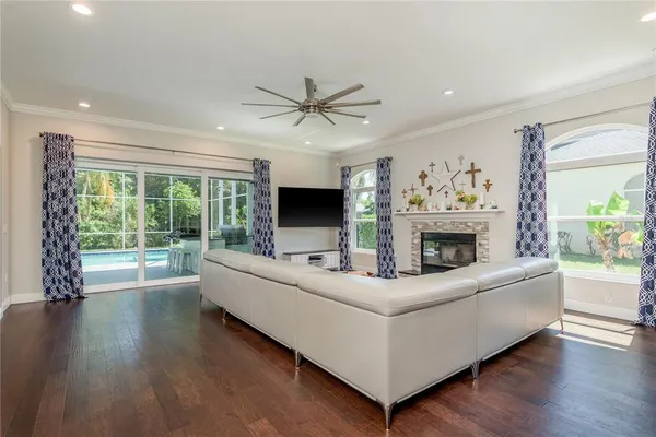 a spacious bedroom with a bed and a fireplace