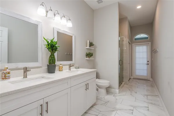 a view of staircase with window