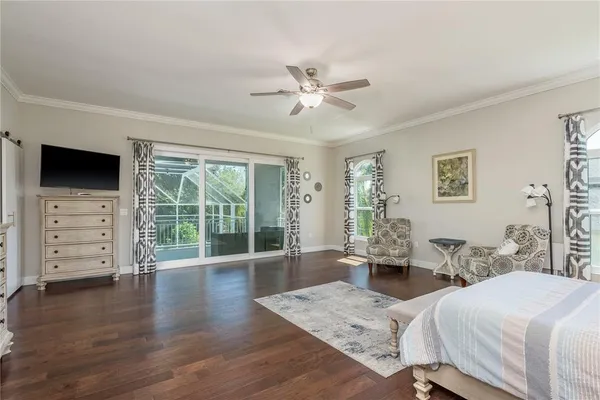 a living room with furniture a window and a table