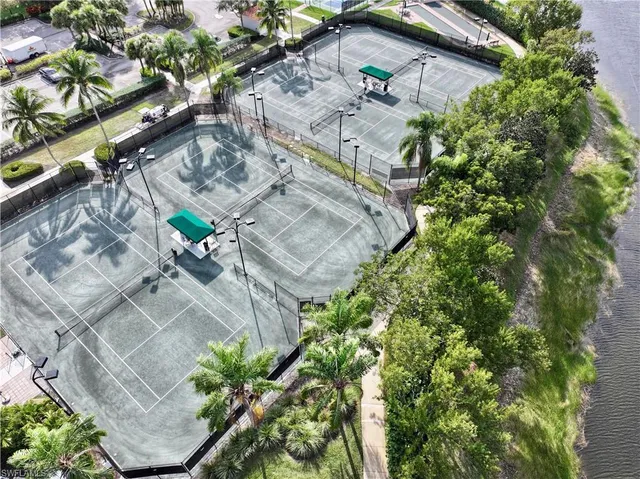 a aerial view of a house with a yard