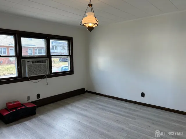 a room with window and ceiling fan