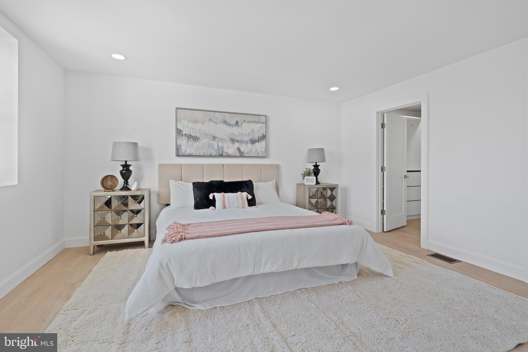 924 Bethlehem Pike Colmar, PA 18915 - Photo 20 of 47 a bedroom with a bed and a painting on the wall