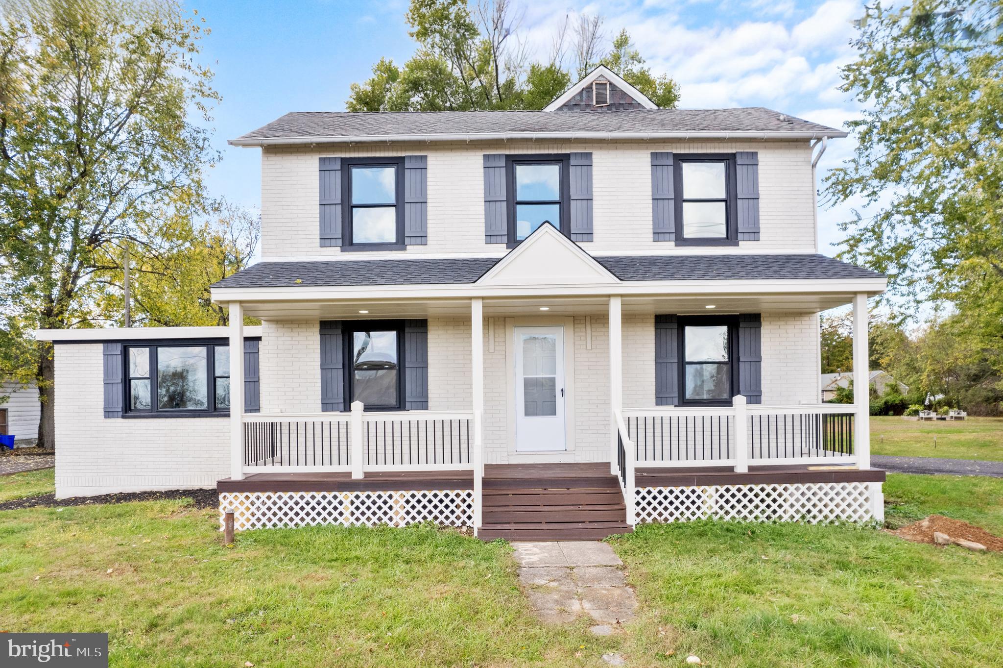 924 Bethlehem Pike Colmar, PA 18915 - Photo 2 of 47 a front view of a house with a garden