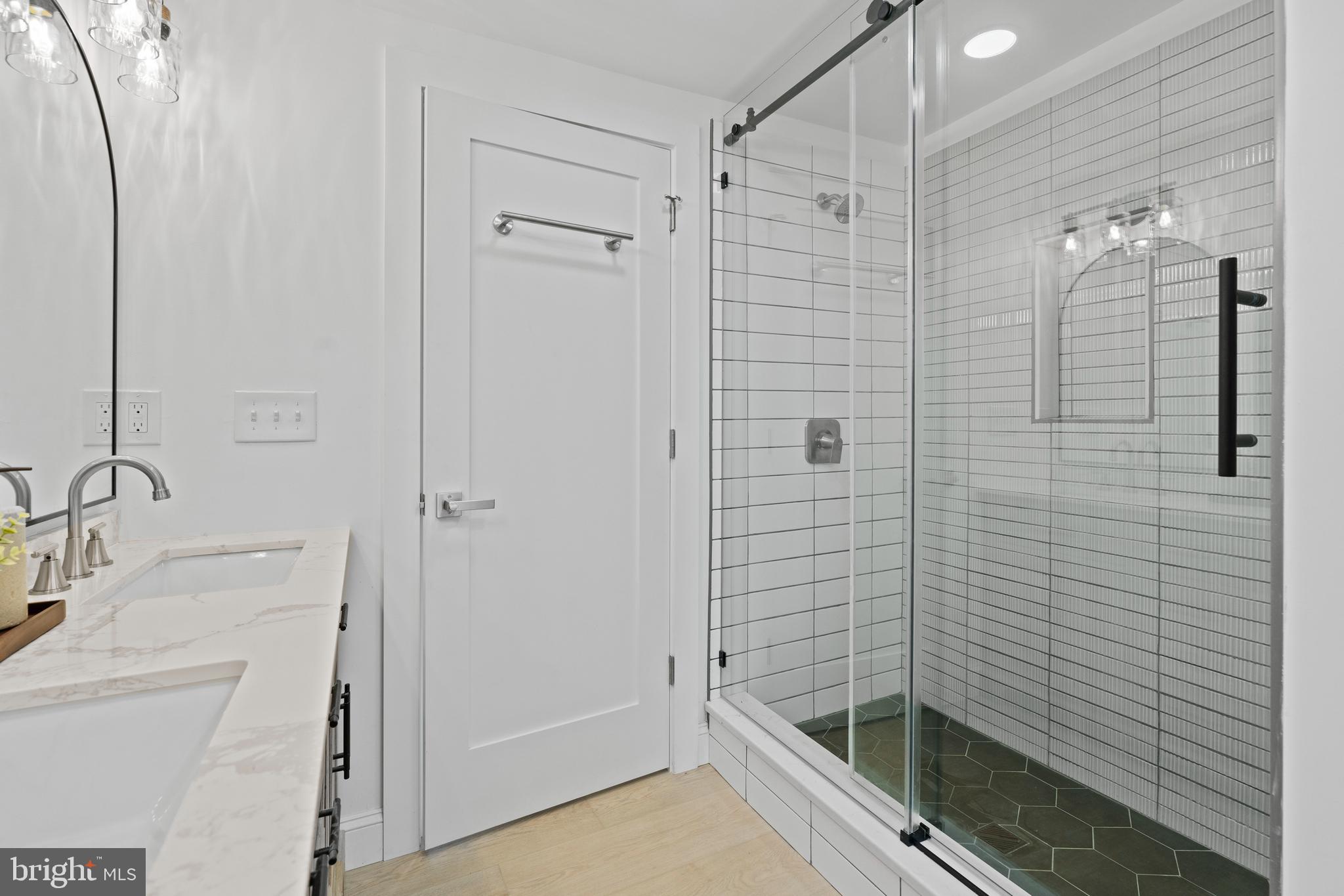 924 Bethlehem Pike Colmar, PA 18915 - Photo 29 of 47 a bathroom with a shower and a sink
