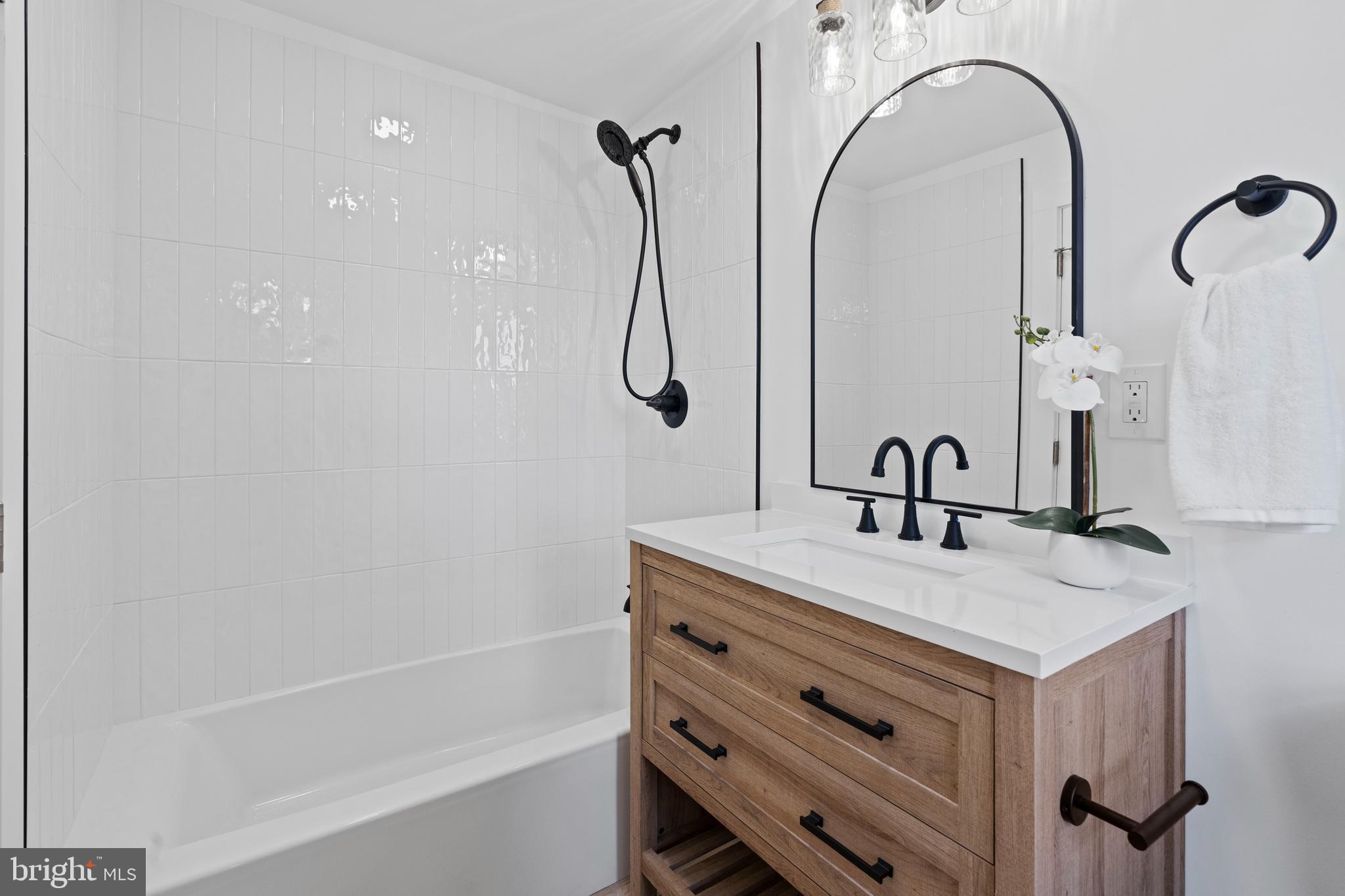 924 Bethlehem Pike Colmar, PA 18915 - Photo 31 of 47 a bathroom with a sink and a mirror