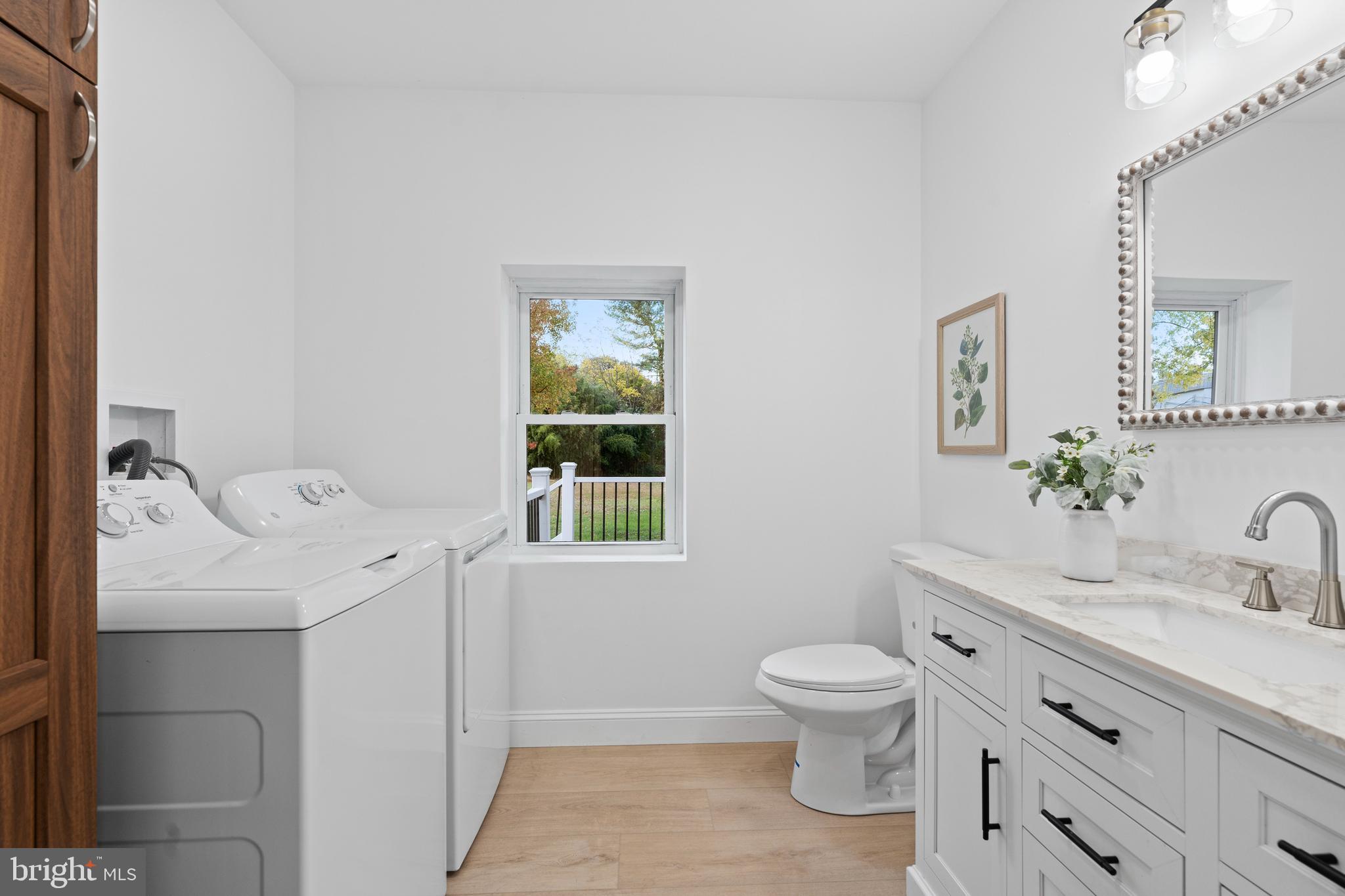 924 Bethlehem Pike Colmar, PA 18915 - Photo 10 of 47 a bathroom with a toilet a sink and mirror