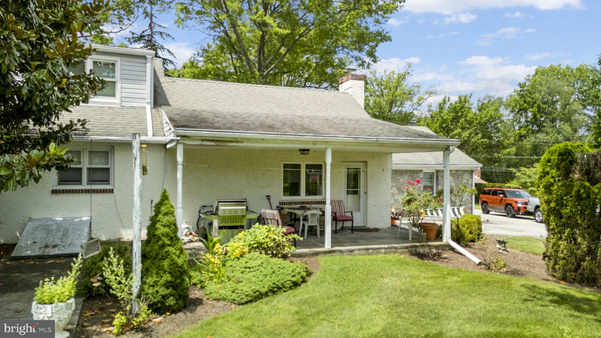 220 Old State Road Berwyn, PA 19312 - Photo 21 of 36 front view of a house with a yard