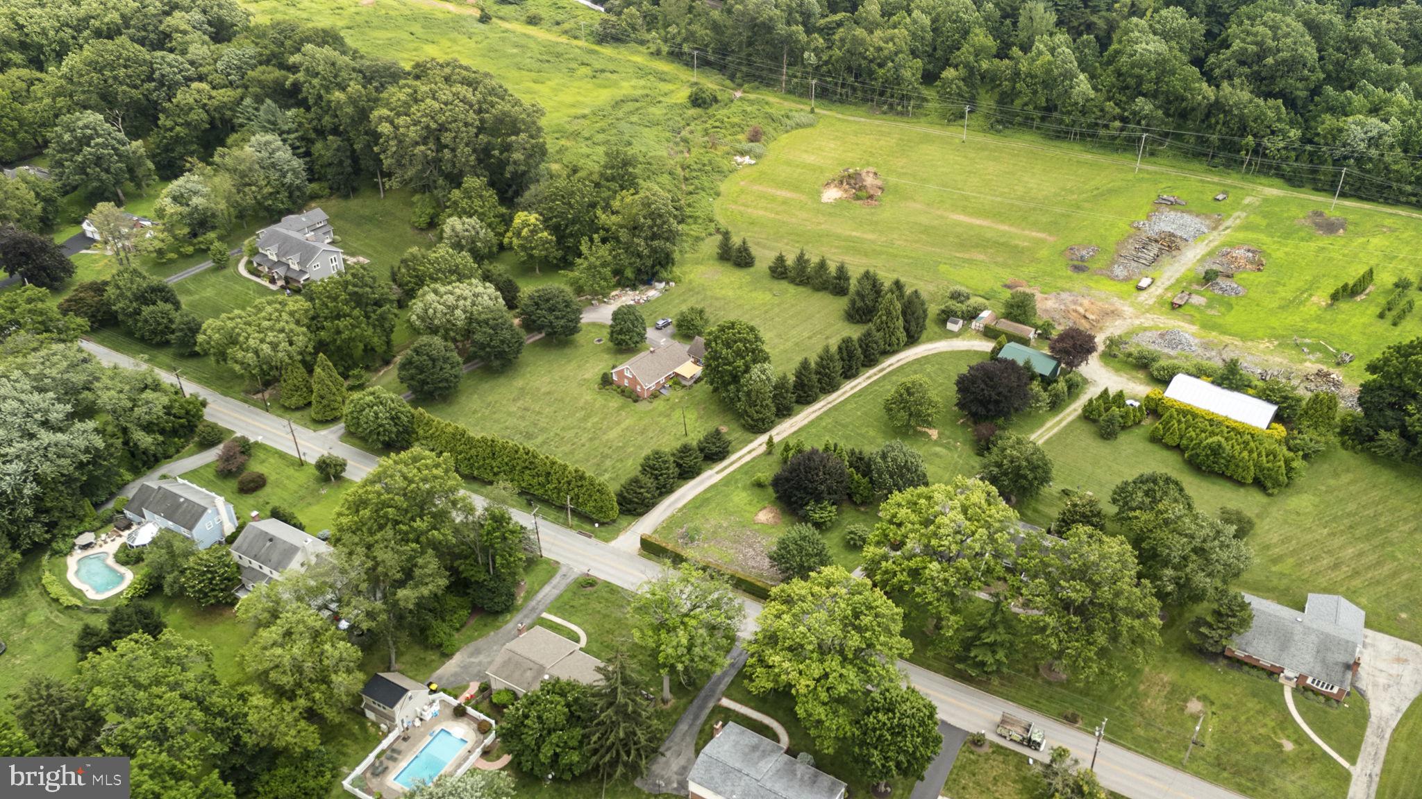 220 Old State Road Berwyn, PA 19312 - Photo 6 of 36 an aerial view of residential houses with outdoor space and swimming pool