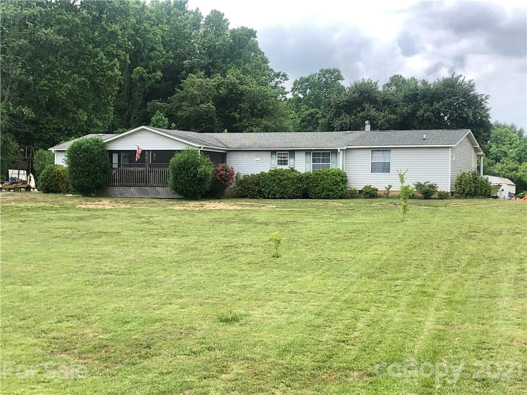 450 Baker Mill Road Cleveland, NC 27013 - Photo 1 of 1 a front view of a house with a yard