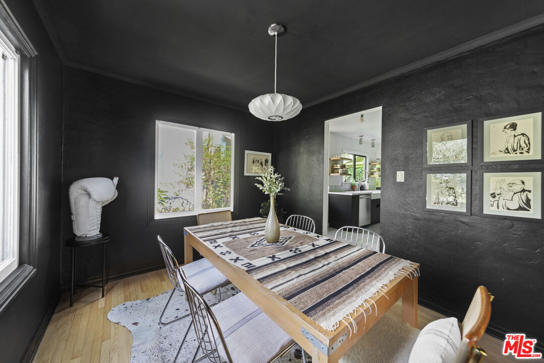 246 Robinson Road Pasadena, CA 91104 - Photo 11 of 43 a view of a dining room with furniture window and wooden floor