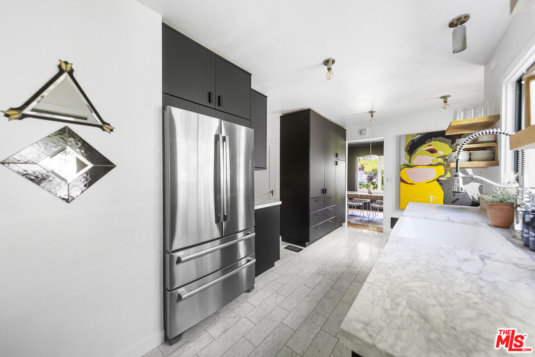 246 Robinson Road Pasadena, CA 91104 - Photo 15 of 43 a view of a kitchen with furniture and a window