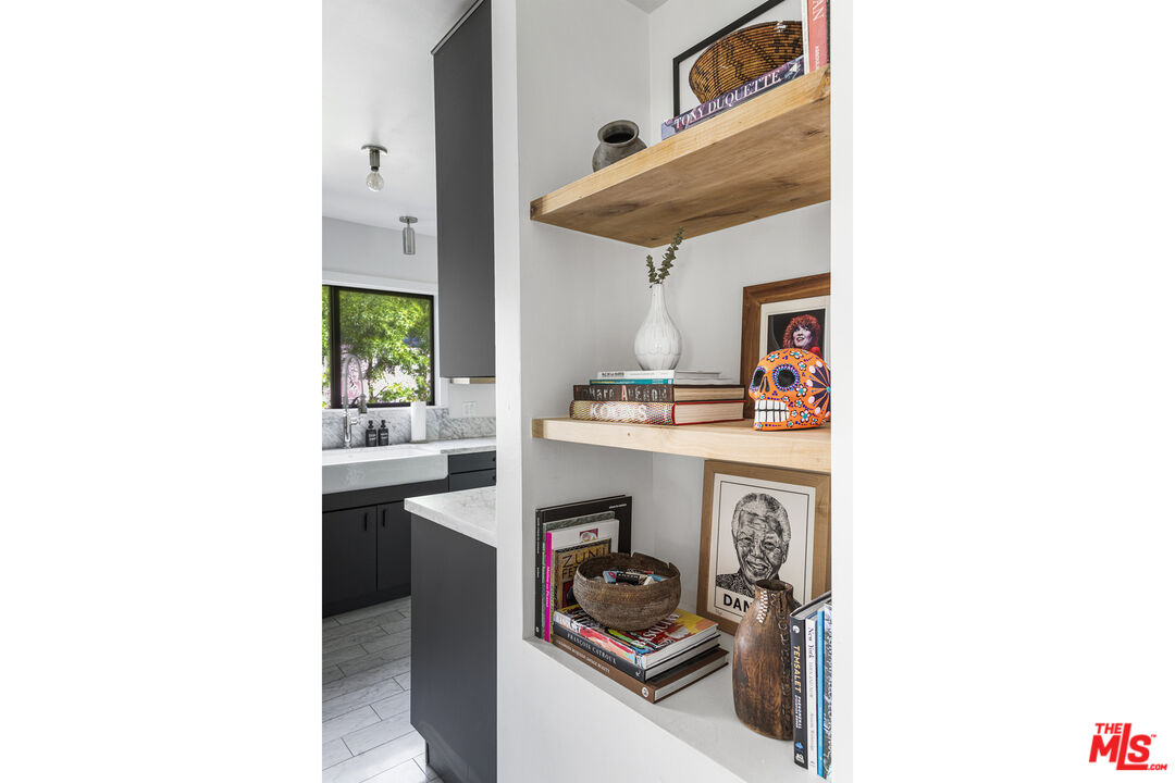 246 Robinson Road Pasadena, CA 91104 - Photo 16 of 43 a kitchen with a sink cabinets and a window