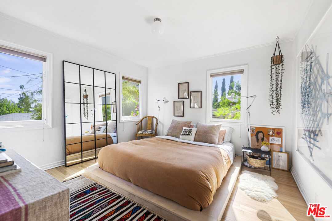 246 Robinson Road Pasadena, CA 91104 - Photo 17 of 43 a bedroom with a bed and a window